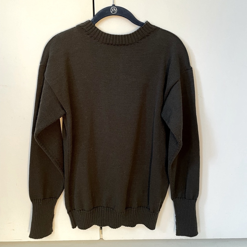 Andersen-Andersen Seaman’s sweater in dark green with signature thumb holes.